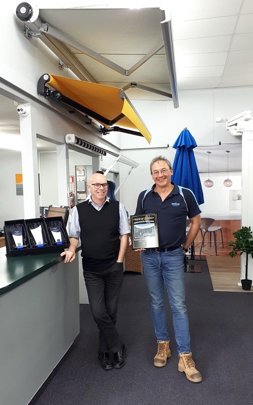 Stephen Sinnott and Freddy van der Schyff at Douglas looking happy with the international awning award