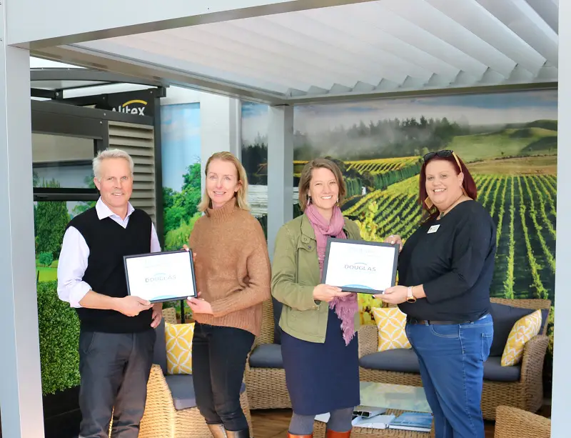 Douglas Owners Pete and Suzanne presenting Donation Plaques to Christina McBeth of Nourished for Nil and Amber McArther from NZ Red Cross Hawkes Bay