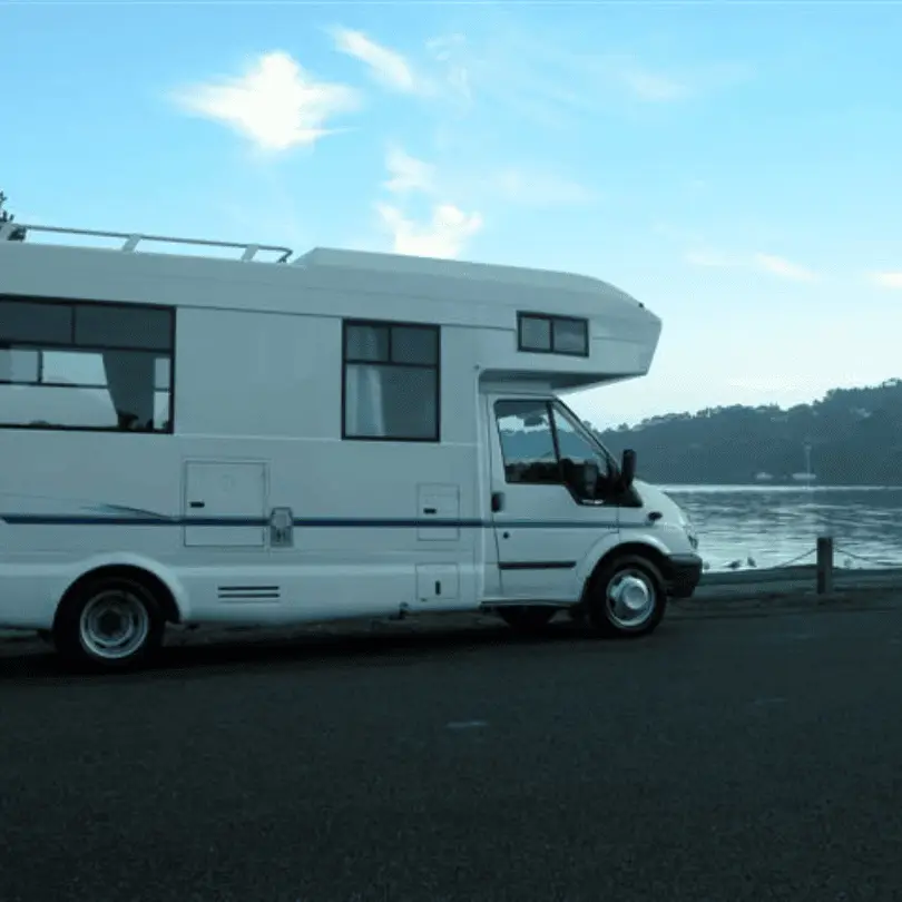 A motorhome by a lake in NZ