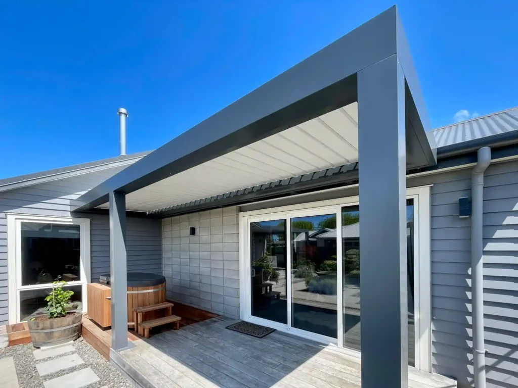 Custom Louvretec roof installed by Douglas Innovation on a Havelock North home, creating a sheltered entrance with adjustable weather protection.